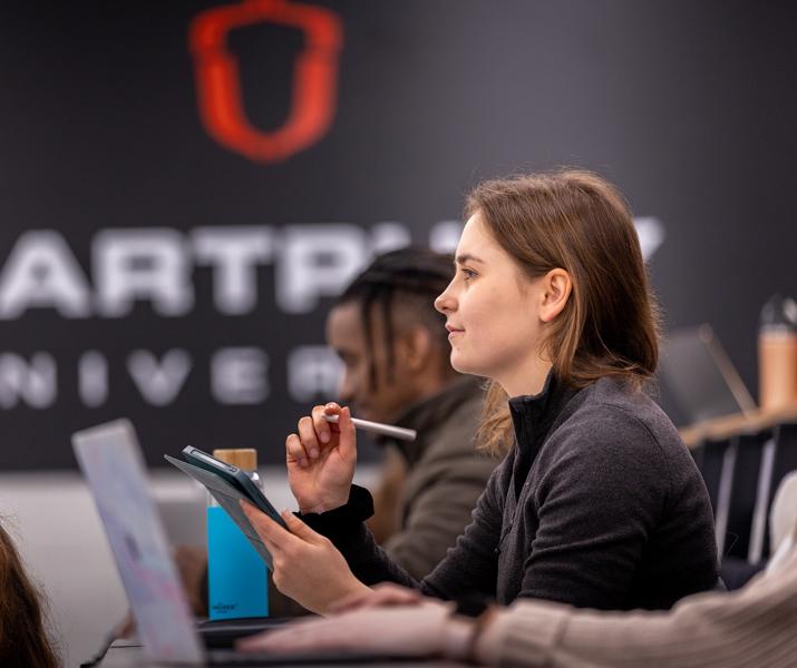 HE Student In Lecture Theatre